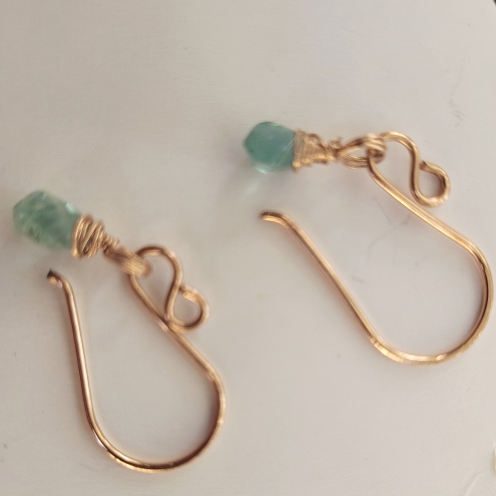 14k rose gold w/ Apatite crystal stones. Hand made.